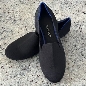 Rothy's Black Slip-Ons with Blue Trim